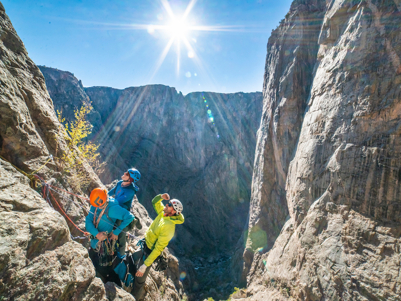 climbers at the belay on maiden voyage in the black canyon