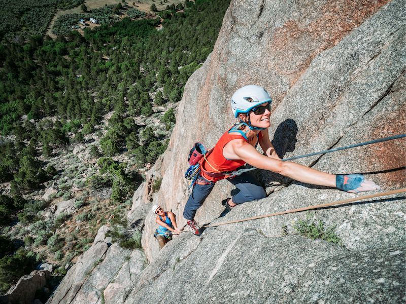 female rock climbers in unaweep canyon multi-pitch rock climbiing