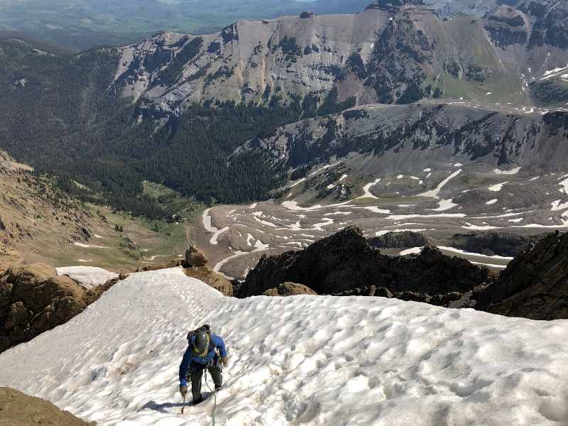 topping out snow climbing snake couloir on mt sneffels